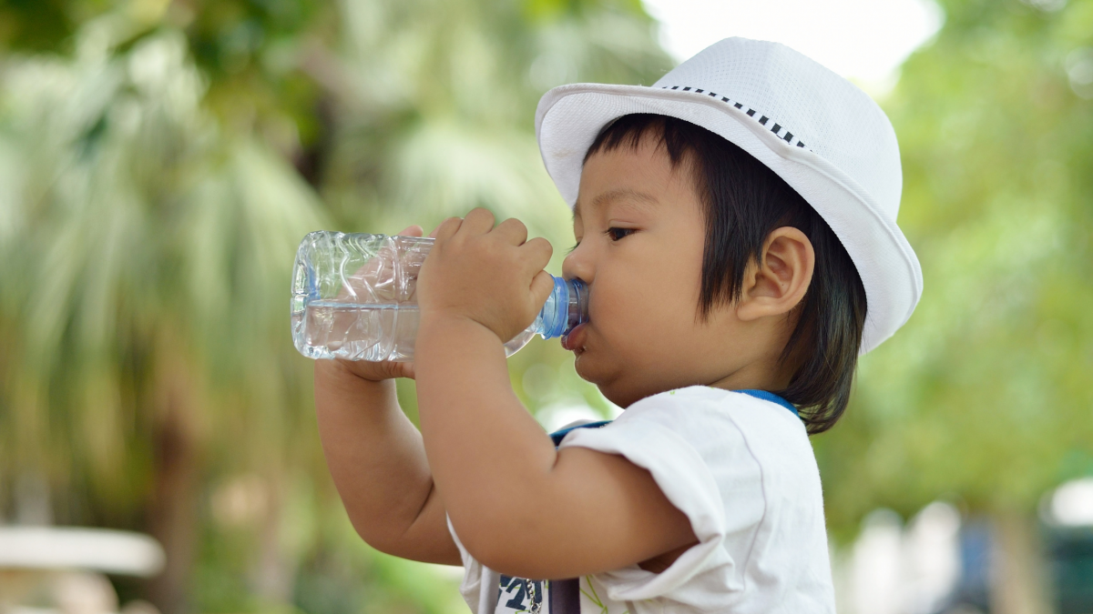 a hat made from UPF fabric helps protect baby's face from the sun all summer long