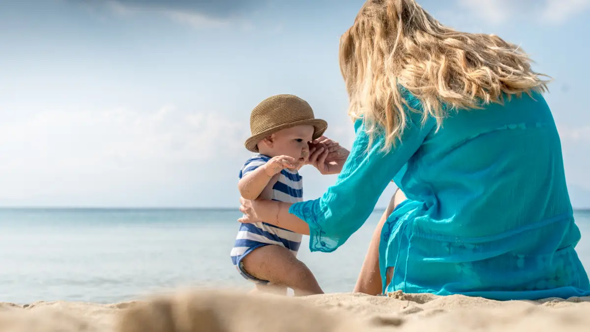don't forget to toss a baby sun hat in your beach bag 