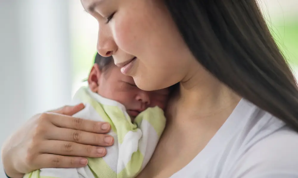 being held helps regulate a baby's heartbeat