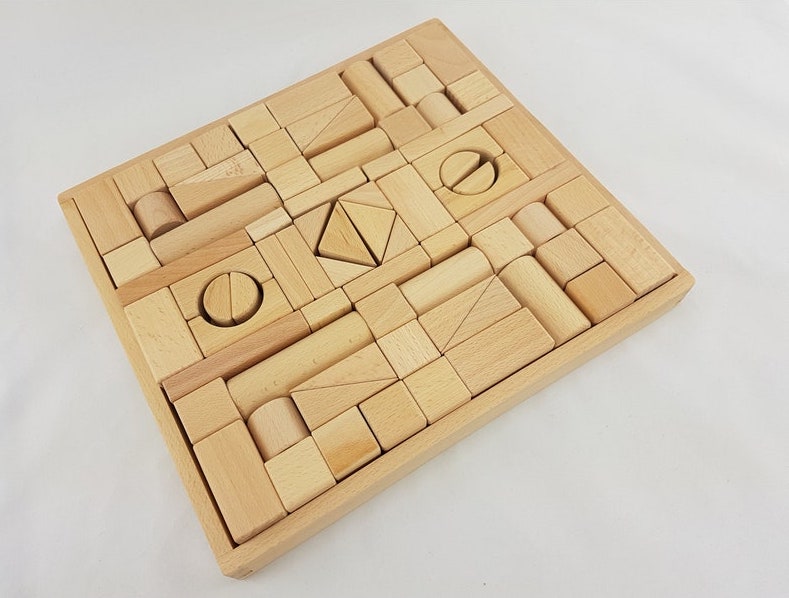 a child can use wood blocks in many ways