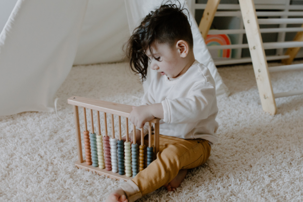 child with abacus