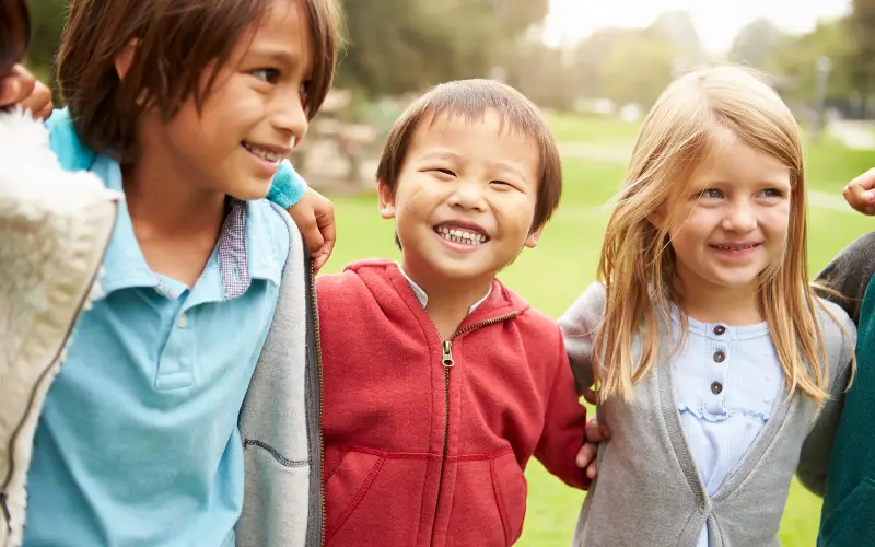 three smiling children - diversity