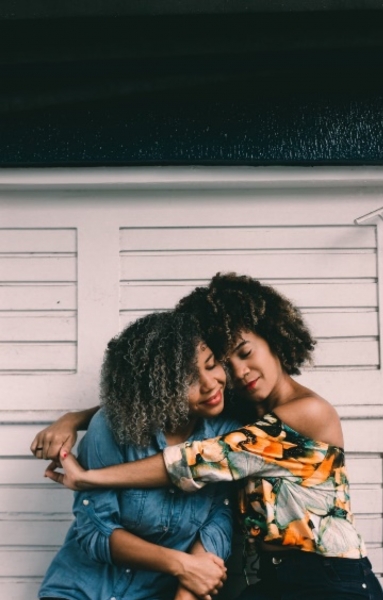 sisters hugging